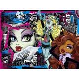 Dzieci układają puzzle 104 elementy z motywem Monster High.