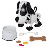 Piesek Bailey je z miski i bawi dzieci swoimi funkcjami