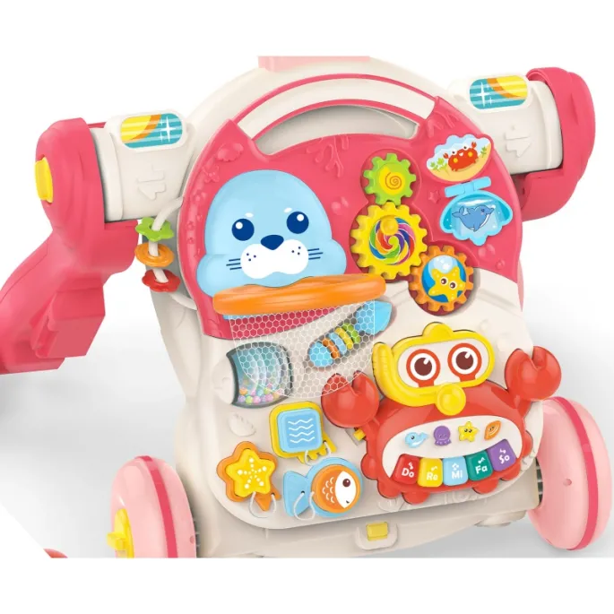 Stolik edukacyjny dla maluchów z klockami i grzechotką.