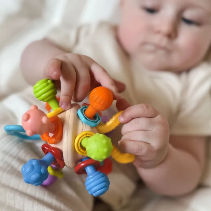 Gryzak i grzechotka 2w1 od WOOPIE dla małych dzieci