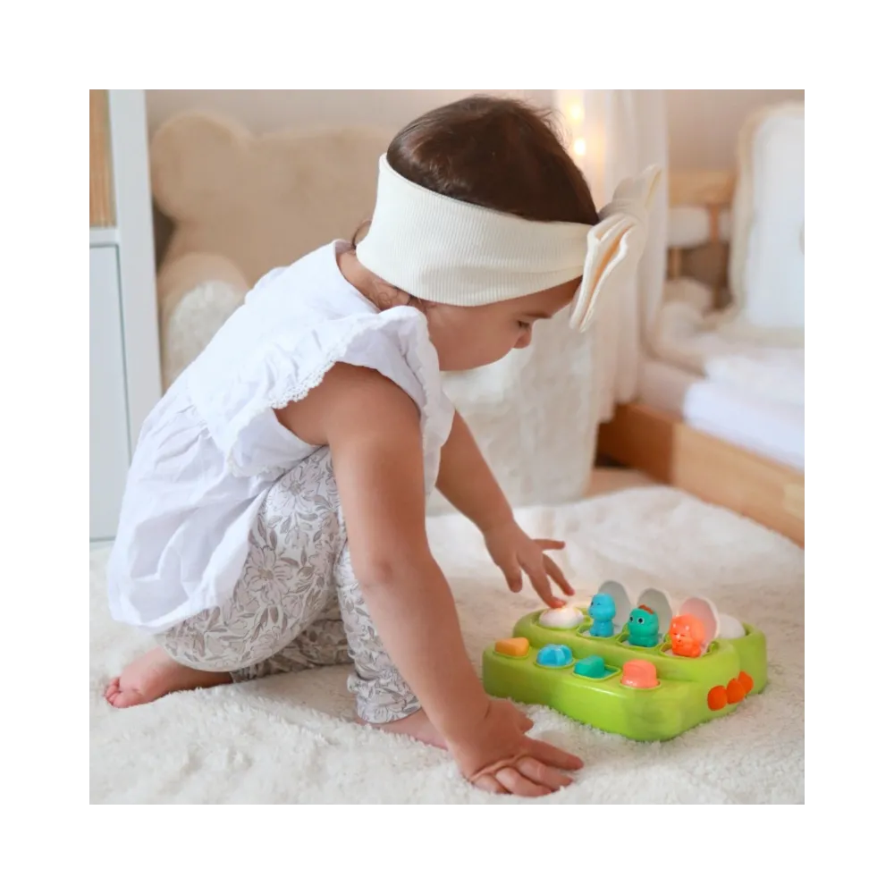 Dinozaury wyskakujące przy naciśnięciu przycisków.