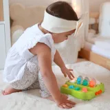 Dinozaury wyskakujące przy naciśnięciu przycisków.