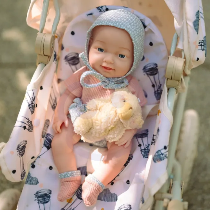 Lalka WOOPIE w wysokości 36 cm z butelką i smoczkiem