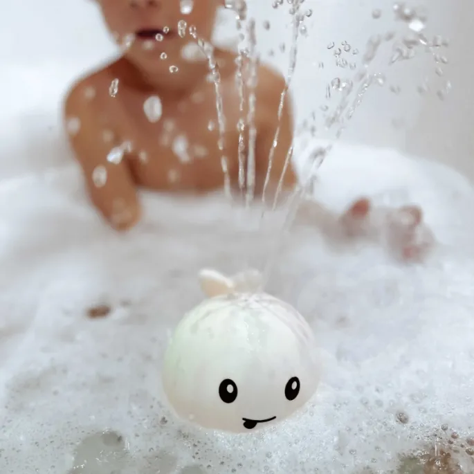 Zabawka kąpielowa z tryskającą wodą i światłem