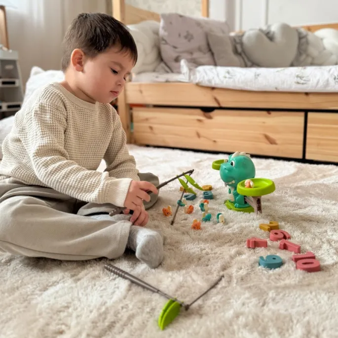 Zabawka matematyczna z łowieniem rybek dinozaurów