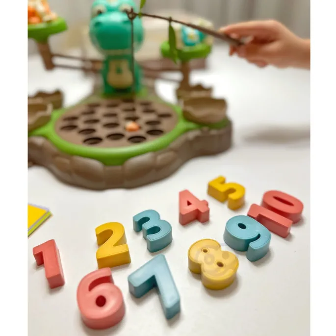 Dinozaury i wędki w wyjątkowej zabawce edukacyjnej WOOPIE.