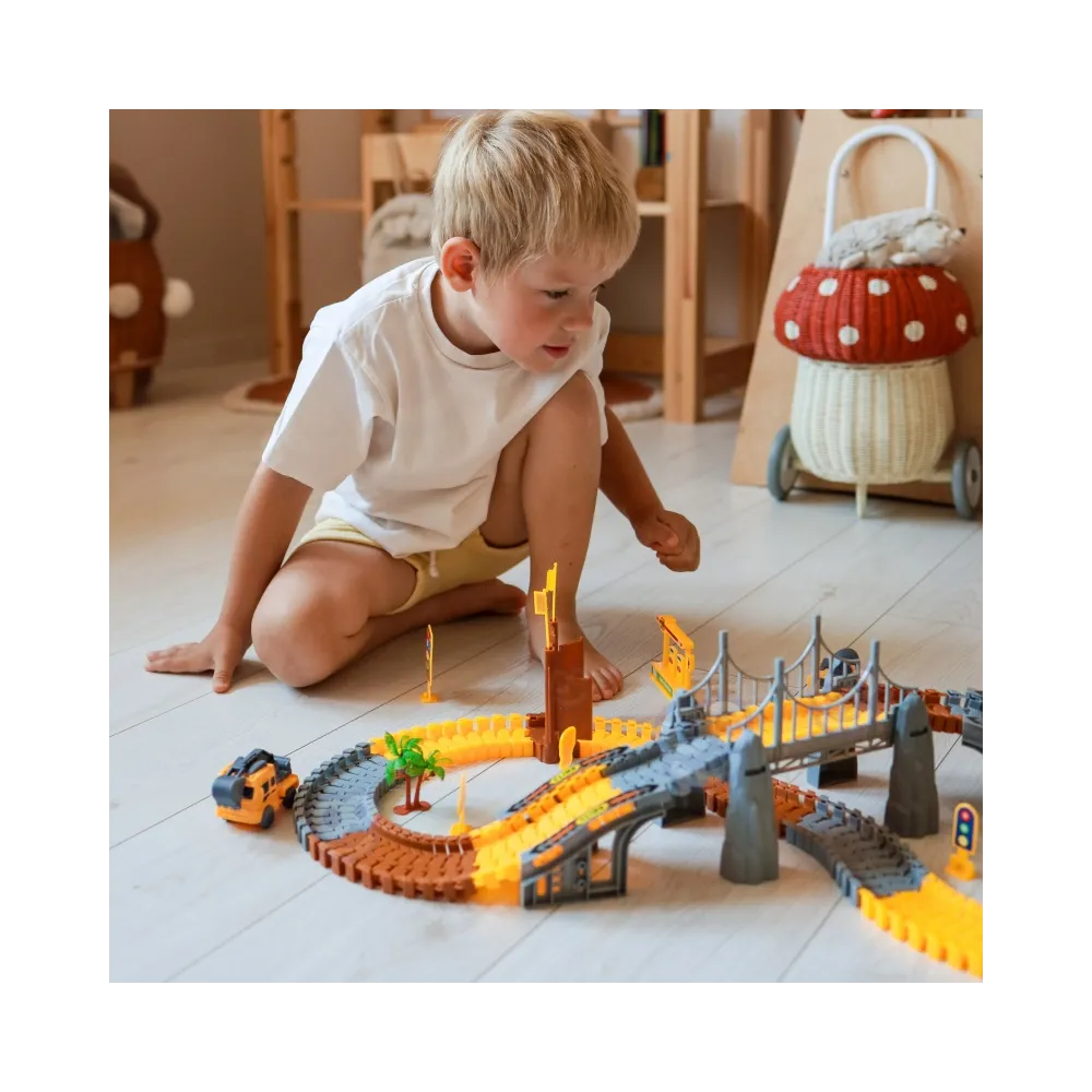 Pojazdy budowlane z zestawu Woopie na elastycznym torze