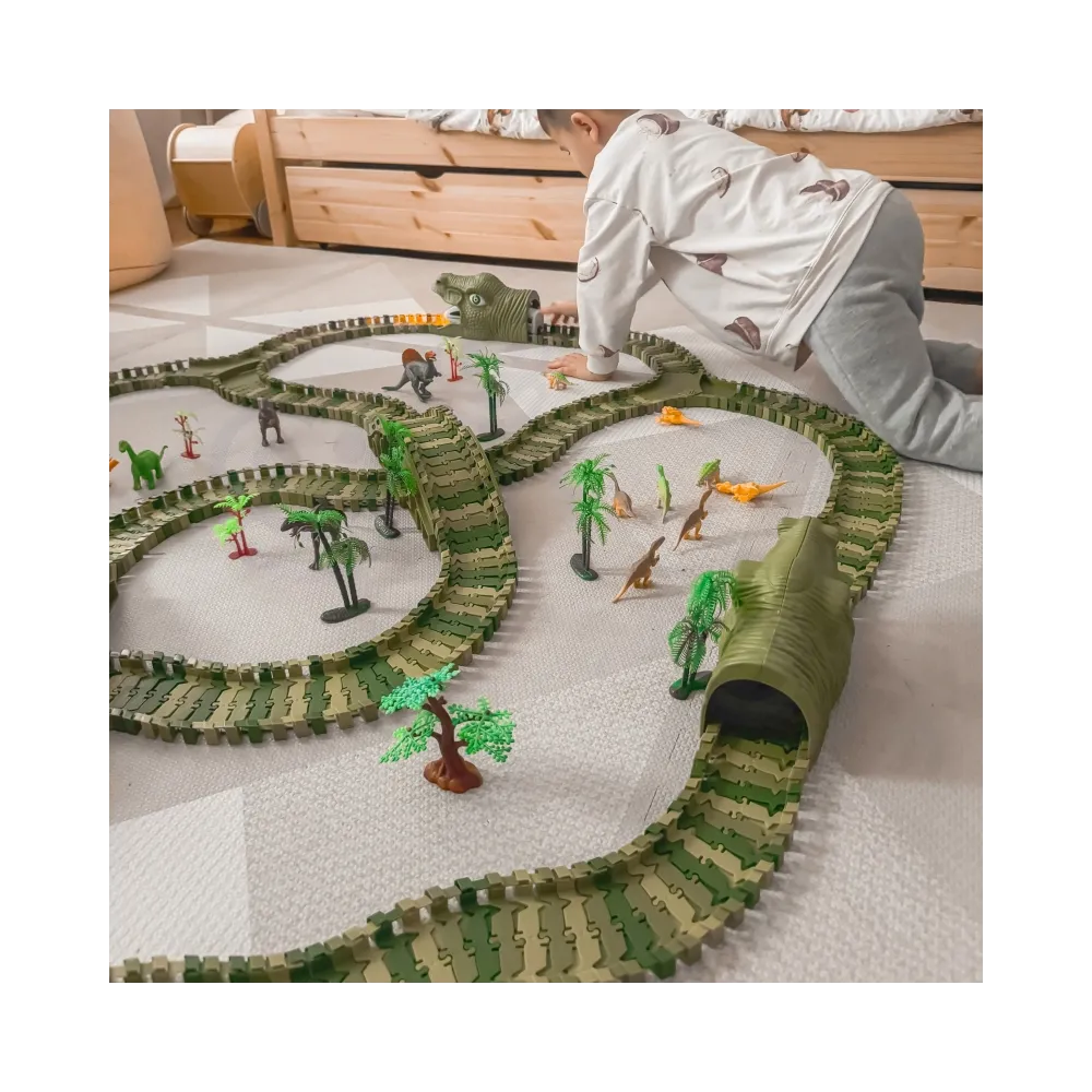 Elektryczny samochodzik na elastycznym torze z motywem dinozaurów