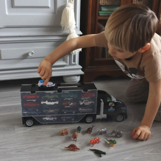 Ciężarówka z lawetą i dinozaurami