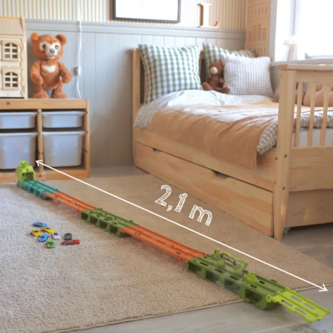 Dinozaur transporter z 8 kolorowymi autkami