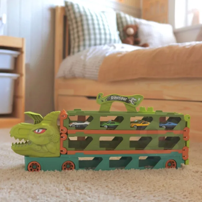 Dinozaur zabawkowy z rozkładanym torem wyścigowym