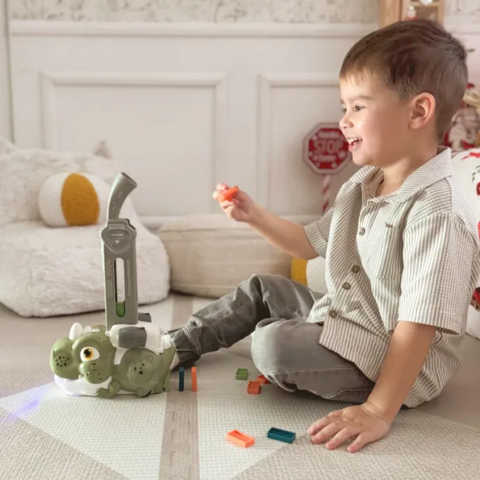 Zestaw interaktywny dinozaur-robot rozkładający kolorowe domino