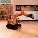 Koparka WOOPIE z funkcją podnoszenia ramienia do materiałów