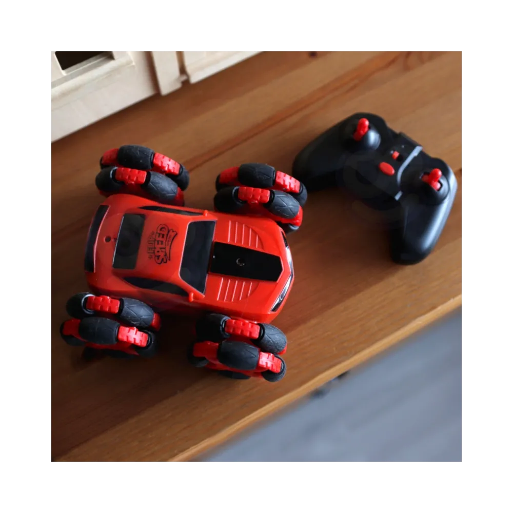 Dynamiczne akrobacje samochodu z elastycznymi oponami.