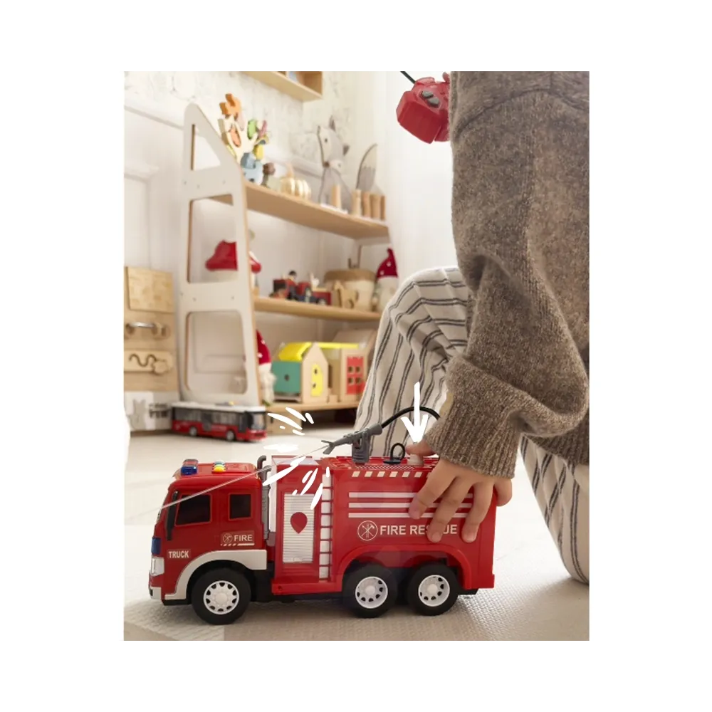 Dziecko bawi się wozem strażackim z pilotem RC