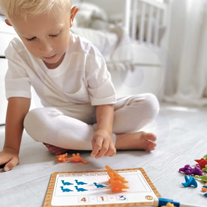 Zestaw do nauki kolorów i liczb z dinozaurami.