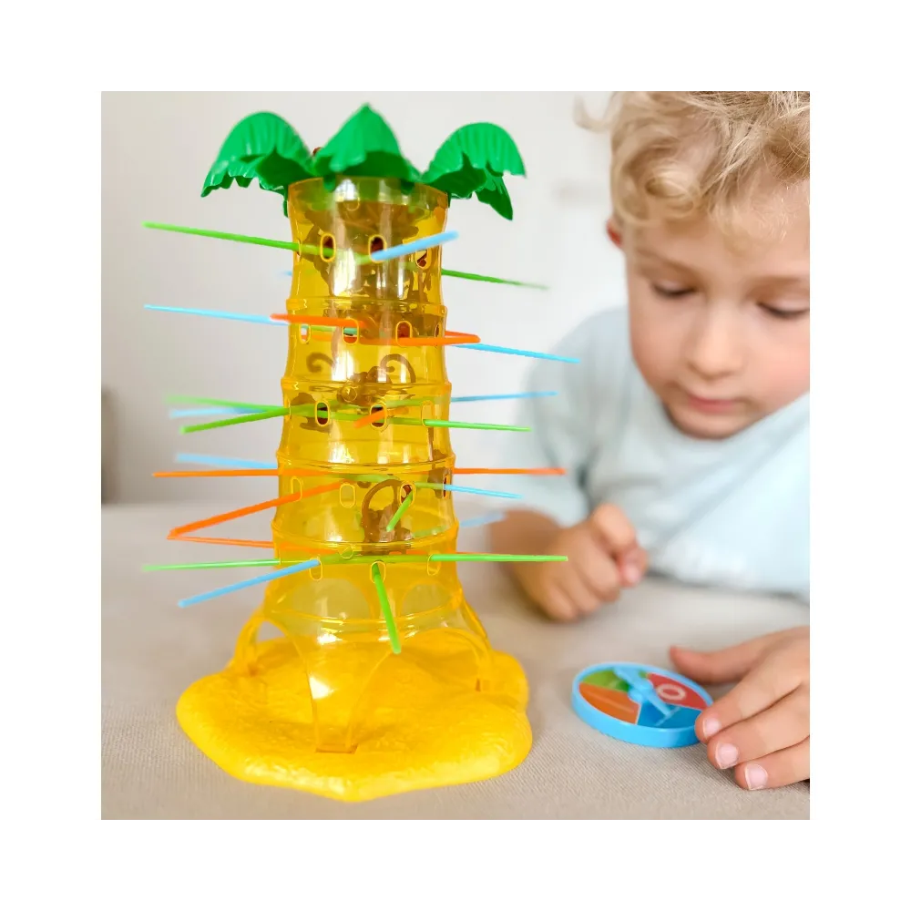 Widok planszy z palmą i kolorowymi patyczkami do gry