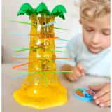 Widok planszy z palmą i kolorowymi patyczkami do gry