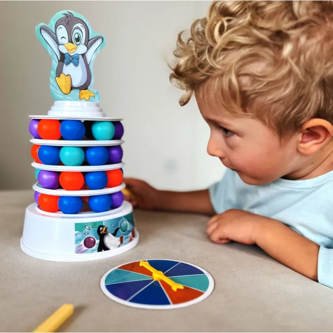 Kolorowe piłeczki do zabawy w grze WOOPIE z pingwinem.