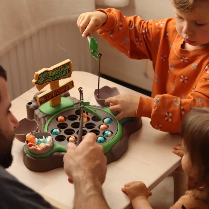 Wędki do gry w łowienie dinozaurów z muzyką.