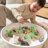 Figurki dinozaurów z dodatkowymi akcesoriami krajobrazowymi