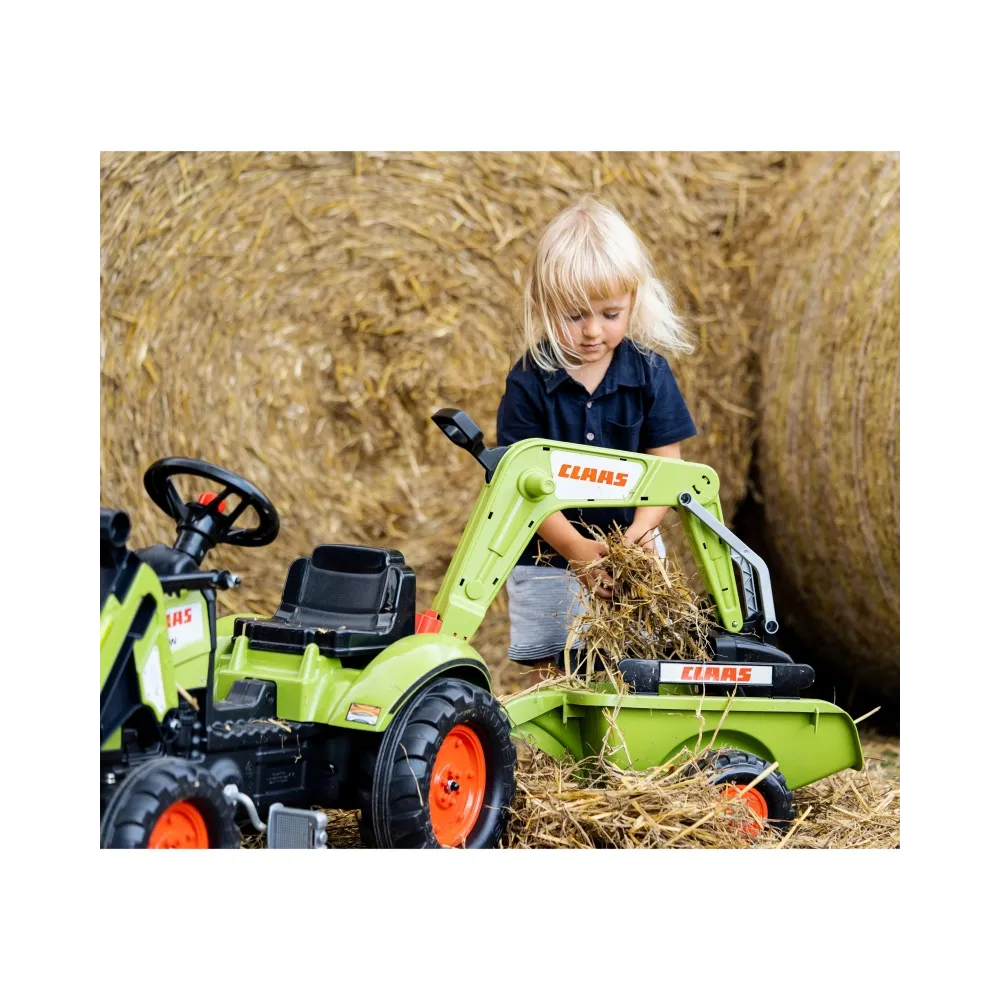 Stylowy traktor CLAAS Arion z łyżką