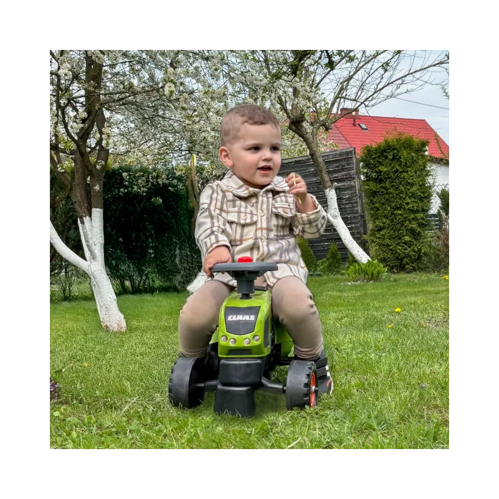 Skrętny traktorek z odczepianą przyczepką dla maluchów.