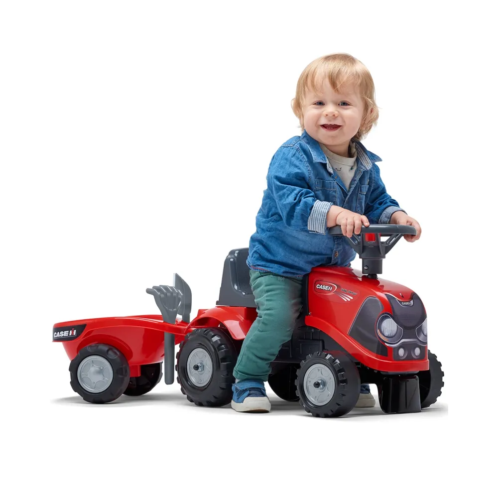 Edukacyjny traktorek z zabawkami do przewożenia