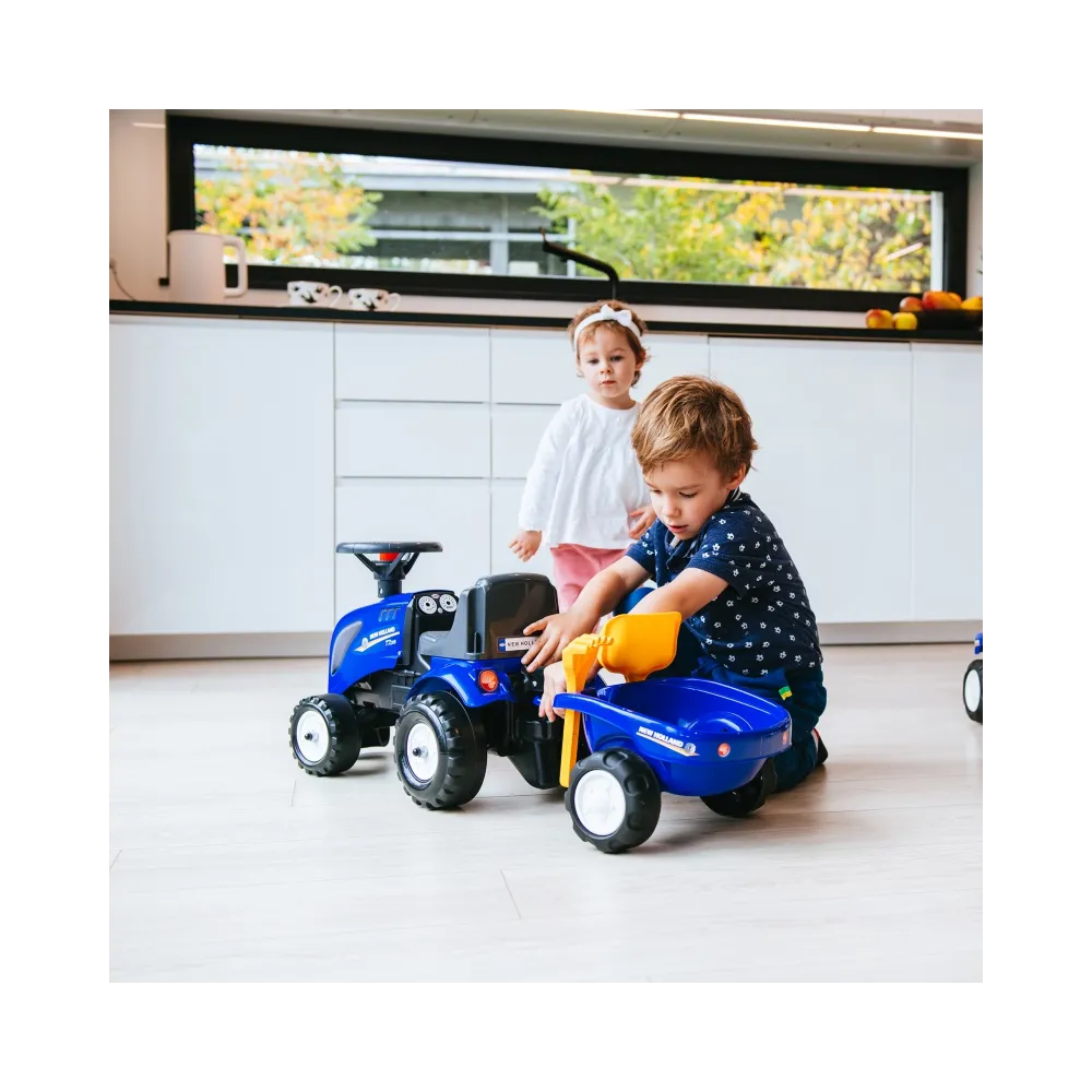 FALK Traktorek Baby New Holland Niebieski z Przyczepką + akc. od 1 roku