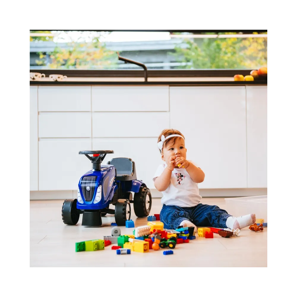 FALK Traktorek Baby New Holland Niebieski z Przyczepką + akc. od 1 roku
