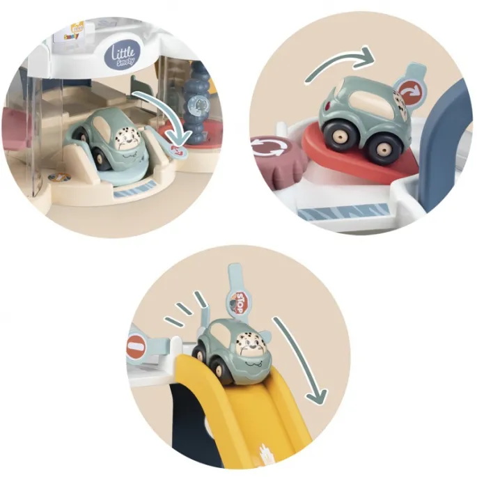 Myjnia samochodowa w garażu SMOBY z obracającymi się myjkami.