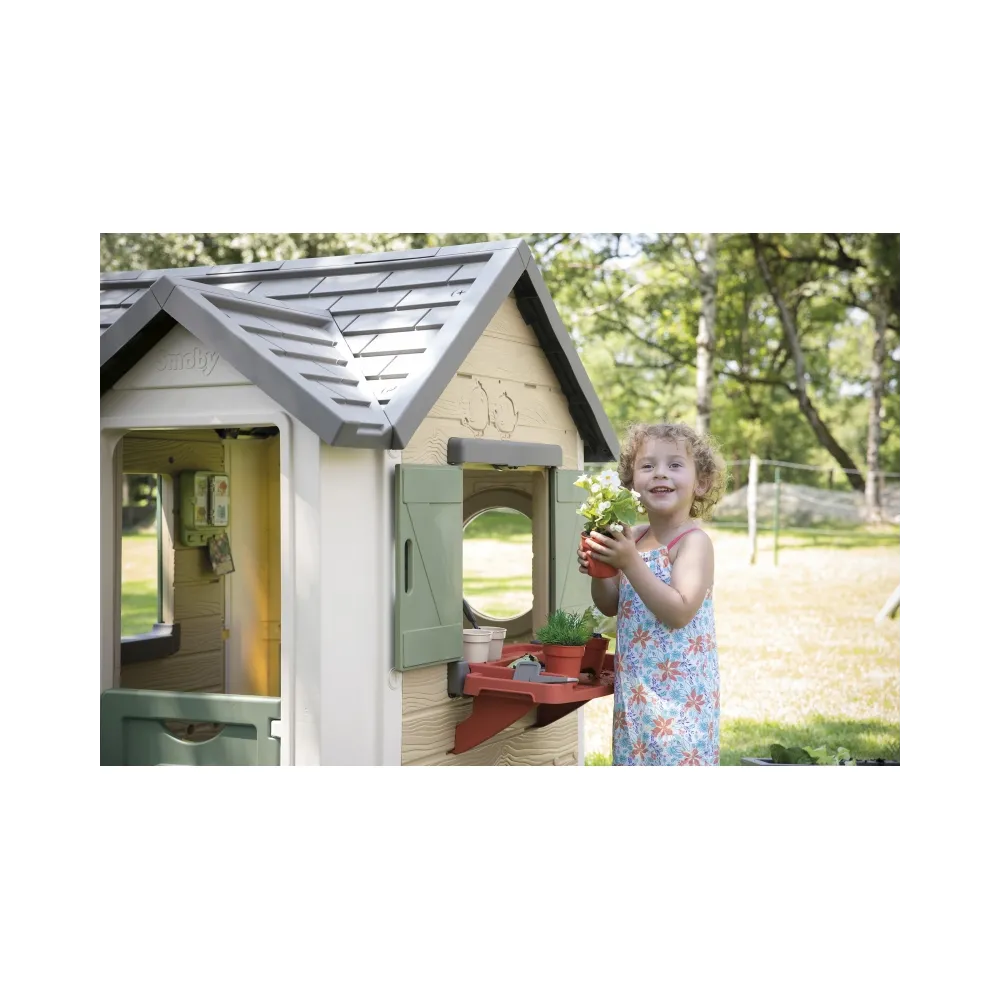 Solidna konstrukcja domku ogrodnika dla małych miłośników roślin