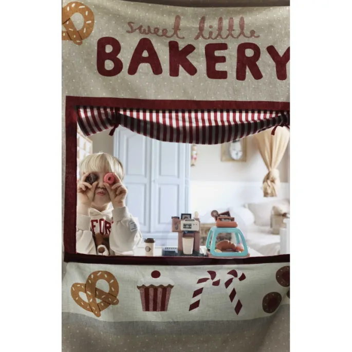 Zabawka kawiarnia z prawdziwą wodą i ruchomymi elementami.