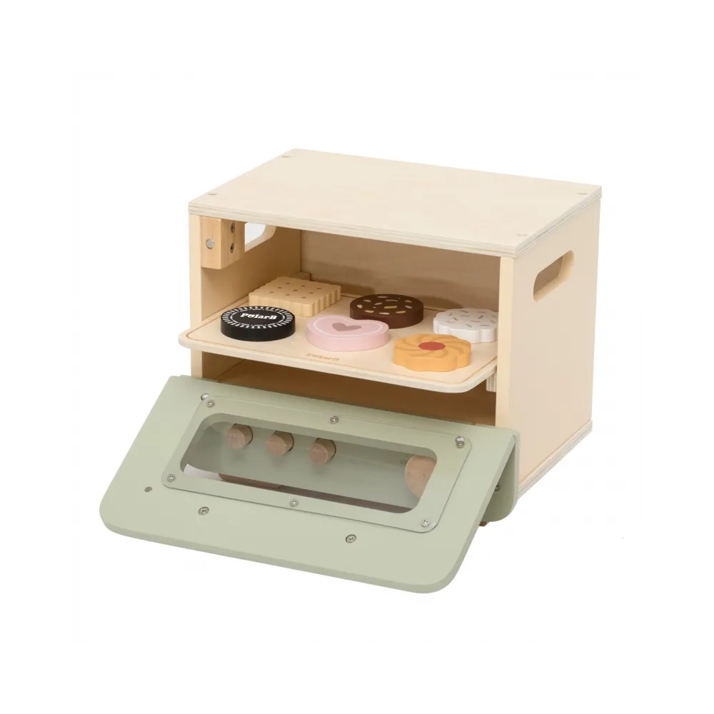 Wesołe pieczenie zabawkowym zestawem kuchennym dla najmłodszych kucharzy