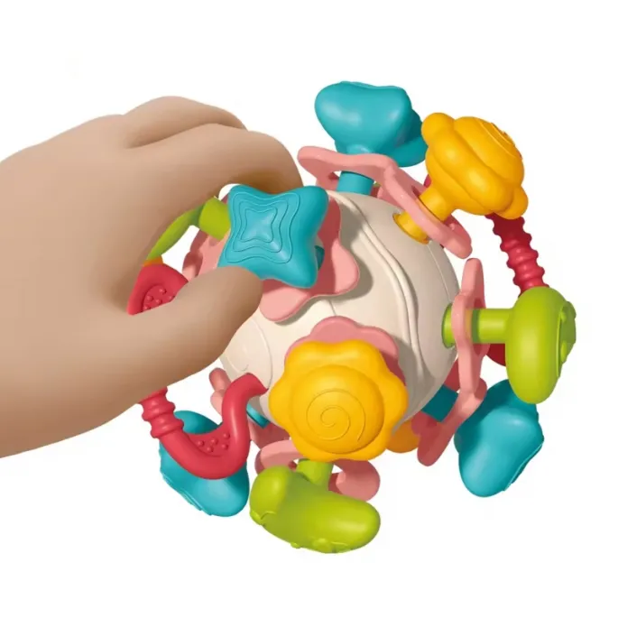 Obrotowe okręgi grzechotki stymulujące zmysły dziecka.
