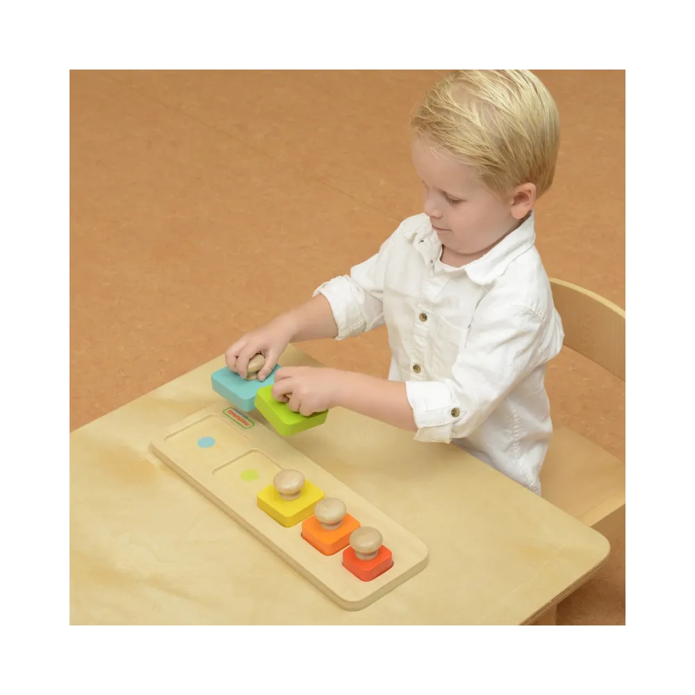 Kolorowa zabawka wspierająca rozwój sensoryczny dzieci.