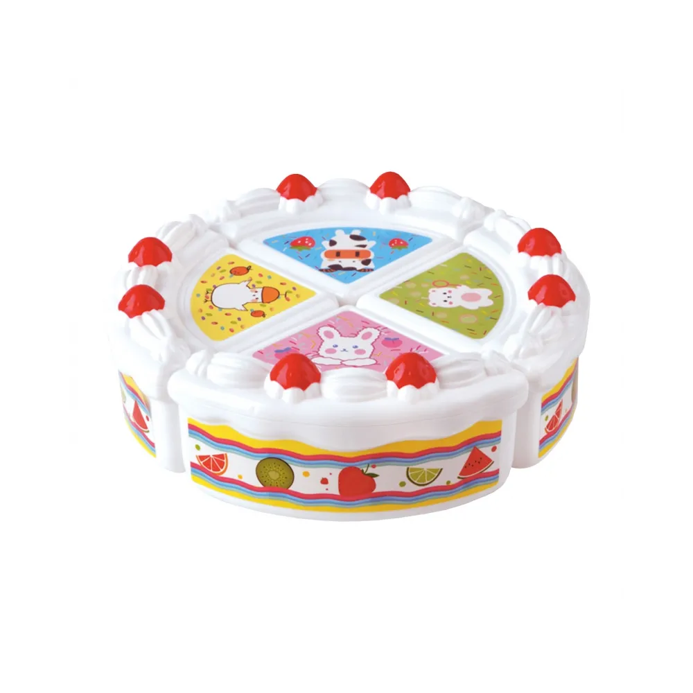 Tort krojony w zestawie z owocami i akcesoriami dla maluchów.