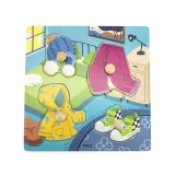 Kolorowe drewniane puzzle z ubraniami dla dzieci