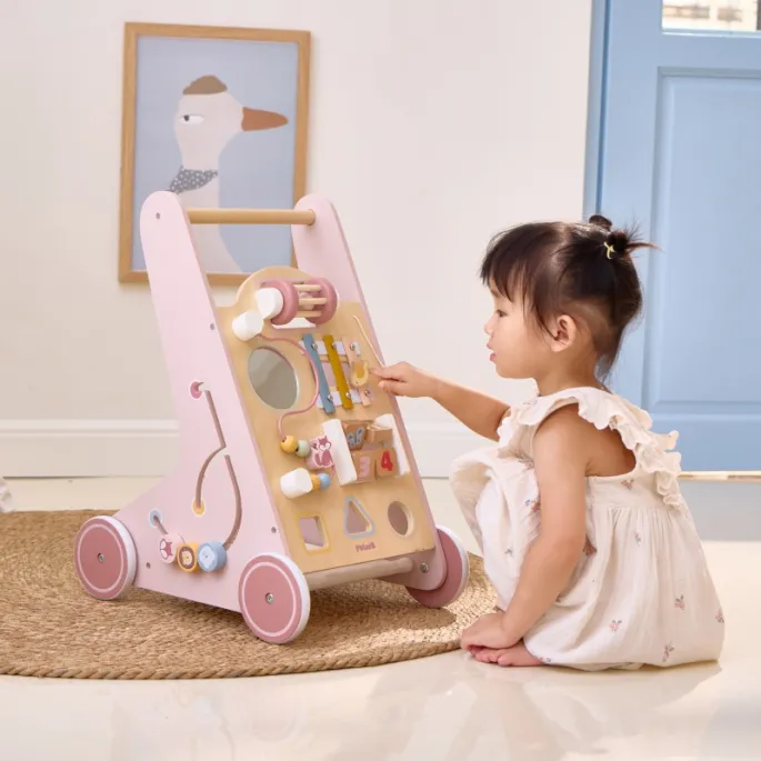 Różowy chodzik z lusterkiem i cymbałkami