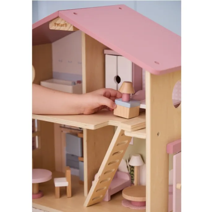 Drewniany domek dla lalek z różnorodnymi pomieszczeniami