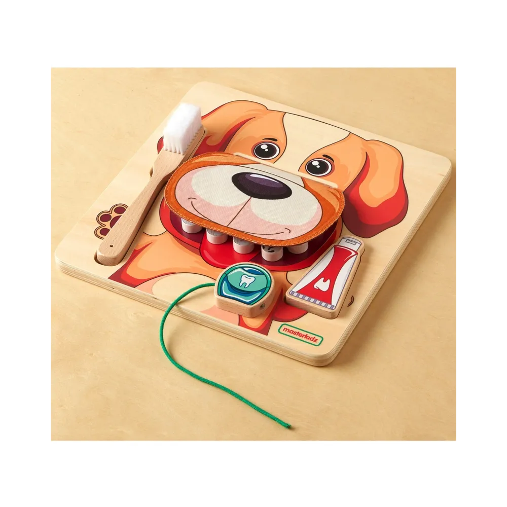 Nauka higieny jamy ustnej przez zabawę z psem.