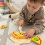 Zabawa w kuchnię z drewnianym piecem do pizzy