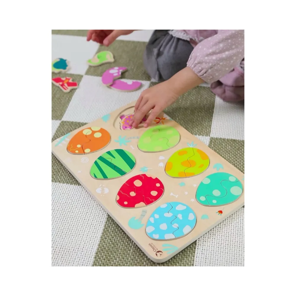 Figurki dinozaurów w drewnianej układance