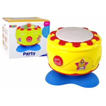 duży interaktywny bębenek muzyczny z migającymi światełkami na białym tle