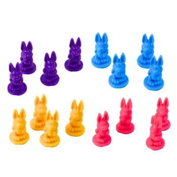 Elementy gry: plansza, karty i figurki króliczków do zabawy