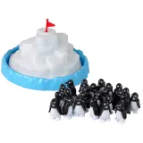 Elementy gry Wspinające się Pingwiny na Lodzie rozłożone na stole