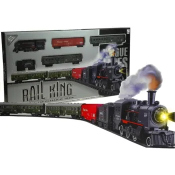 Duża kolejka elektryczna z dymem i światłem na torach