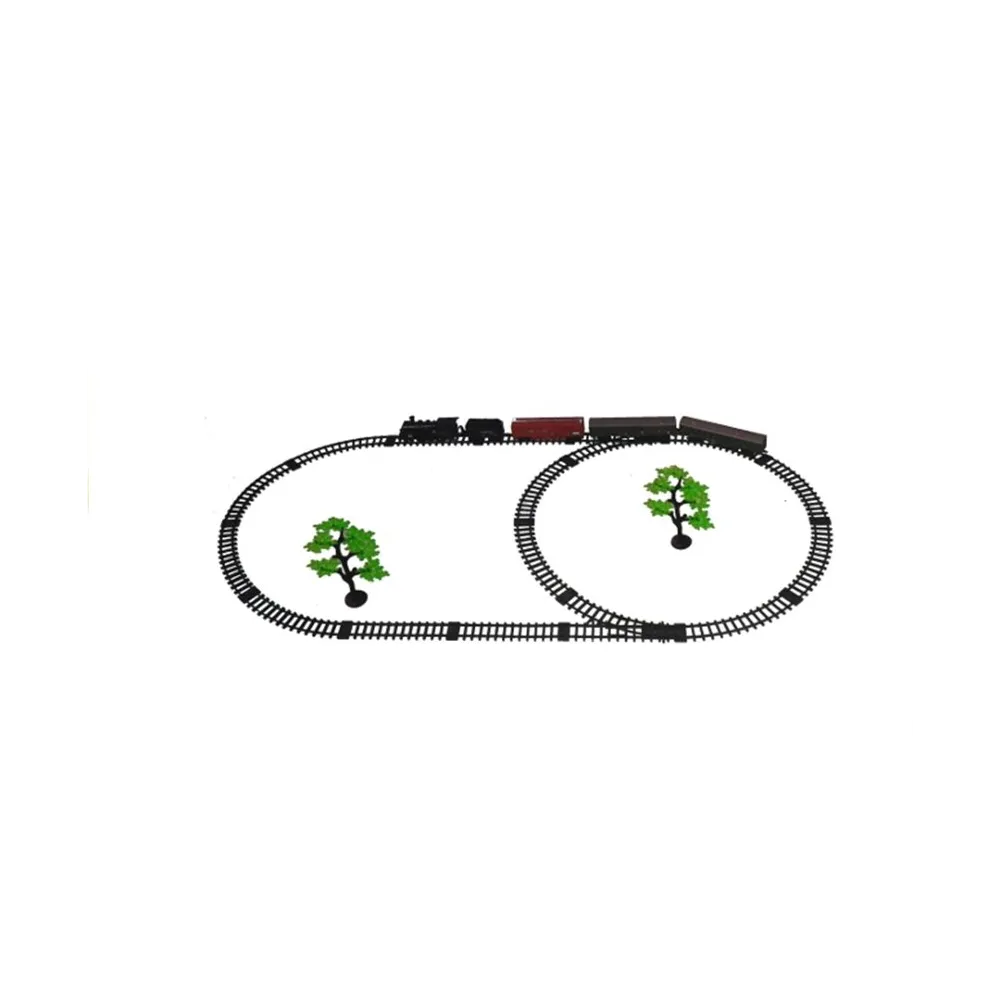 Kolejka elektryczna dla dzieci prezentująca się na tle stacji