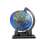 Elementy puzzli 3D do złożenia globusa krok po kroku