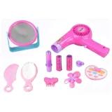 Przejrzysta kosmetyczka z dziecięcymi kosmetykami i suszarką na baterie